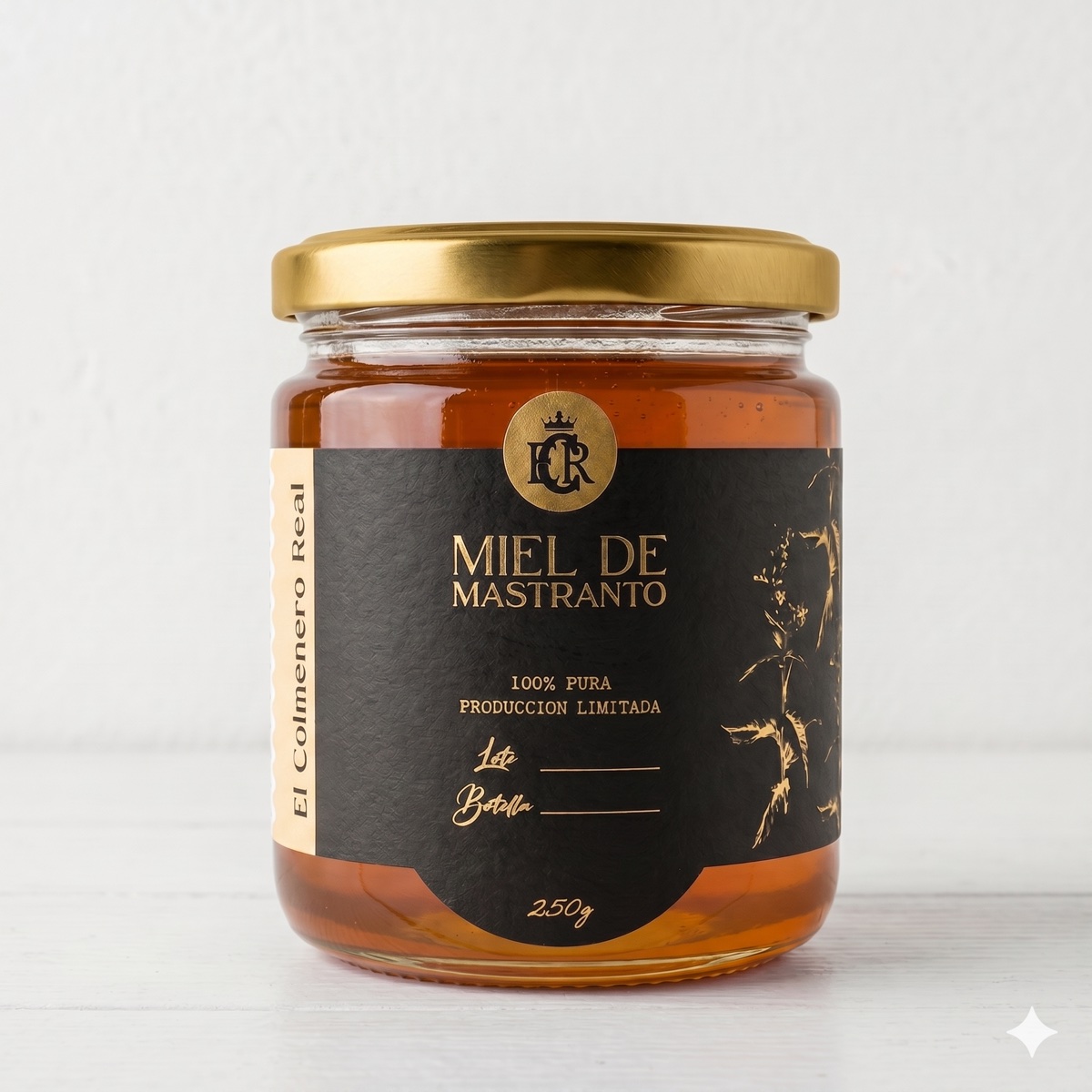 Miel de mastranto El Colmenero Real, 250 g, en frasco de vidrio con etiqueta negra y dorada.